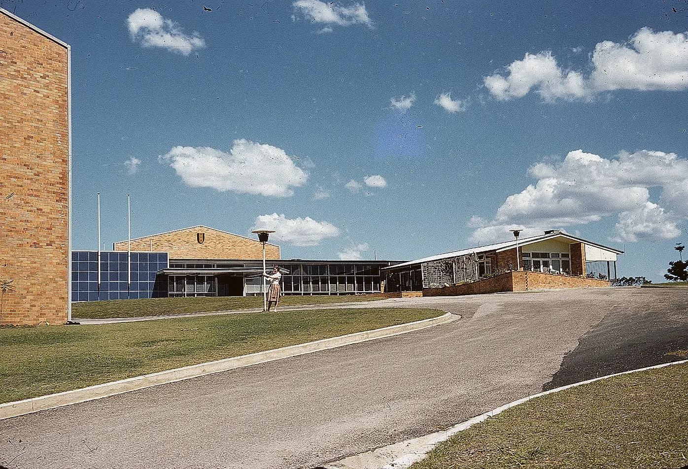 A colour photo of buildings and blue sky.